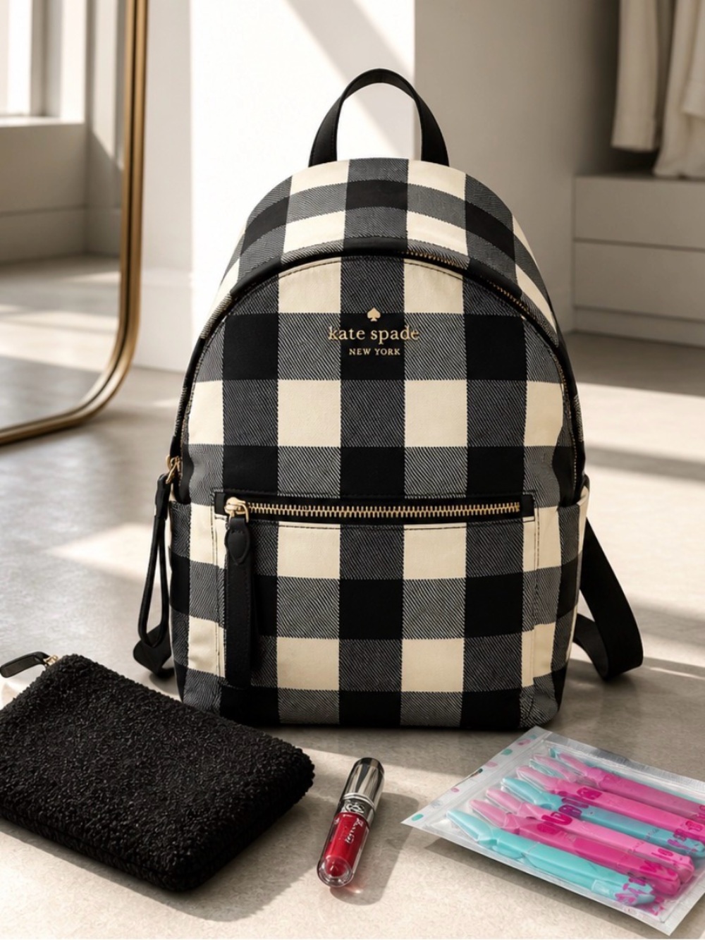 kate spade Black and Cream Gingham Mini Backpack $ Make up bag and lipgloss